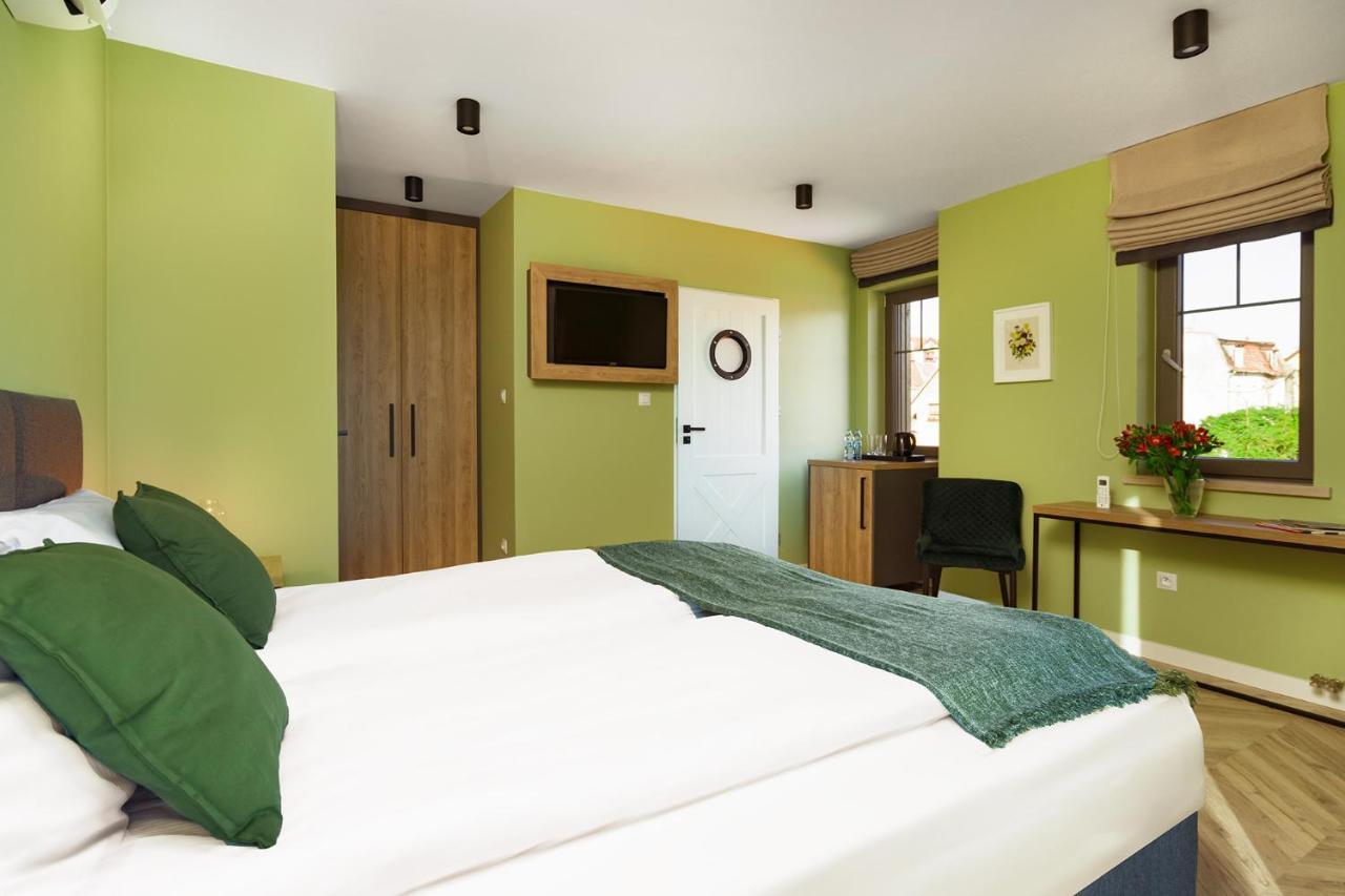 Aparthotel Kamienica Portowa à Mikołajki Extérieur photo