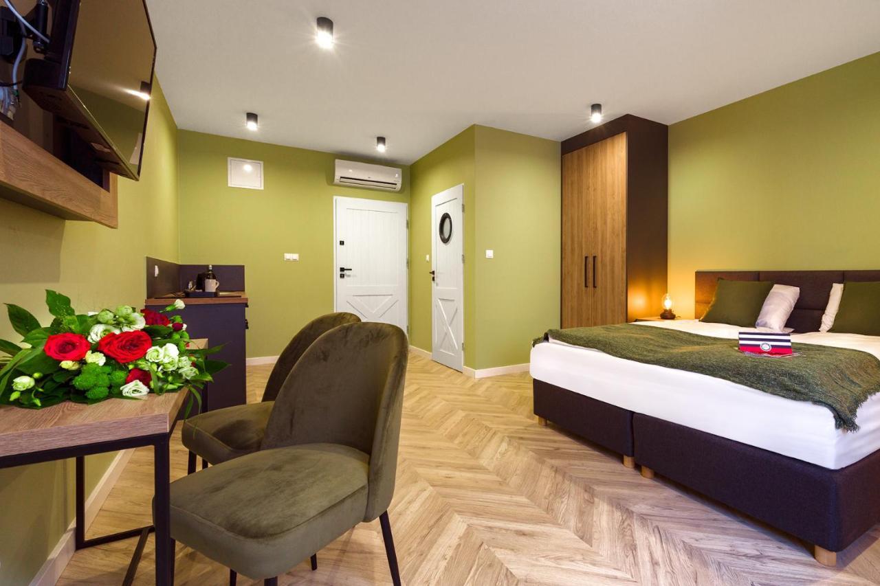Aparthotel Kamienica Portowa à Mikołajki Extérieur photo